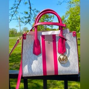 Michael Kors handbag, new, never used, medium size, pink and white with MK logo.